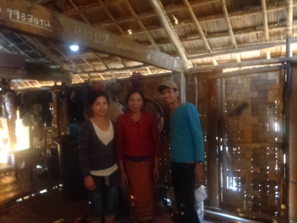 Another happy mom.  Lieng on the left, owner in the middle and Siphan on the right.  It is quite customary for the wives to assist their husbands wherever needed so she dug in and helped to run cable and install the switches.  How cool is that?